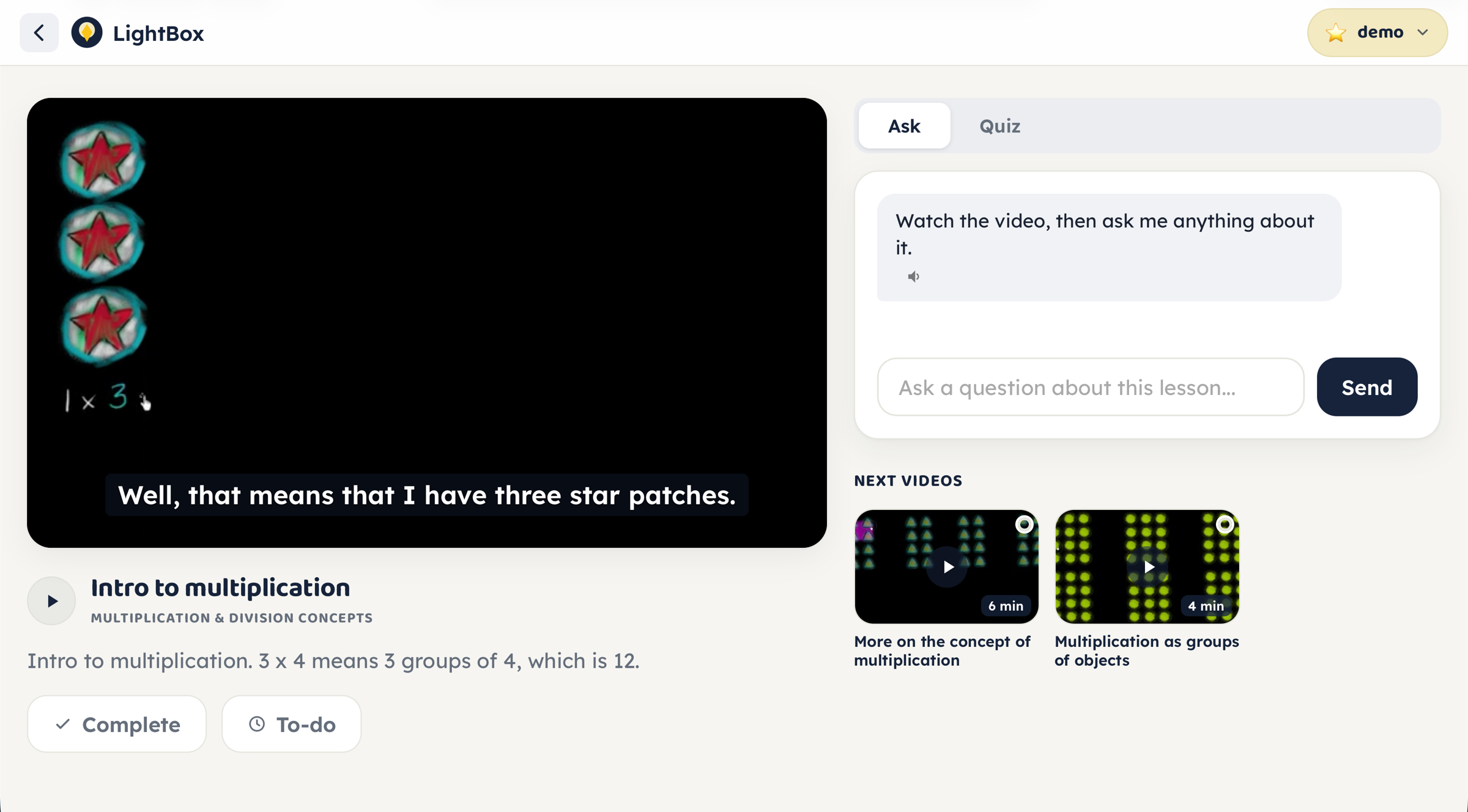 A Lunis lesson: a multiplication video playing, with an Ask tab where the student can question the AI helper, and the next videos queued alongside.